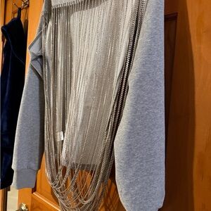 Stunning grey sweatshirt, open back draped with rhinestones